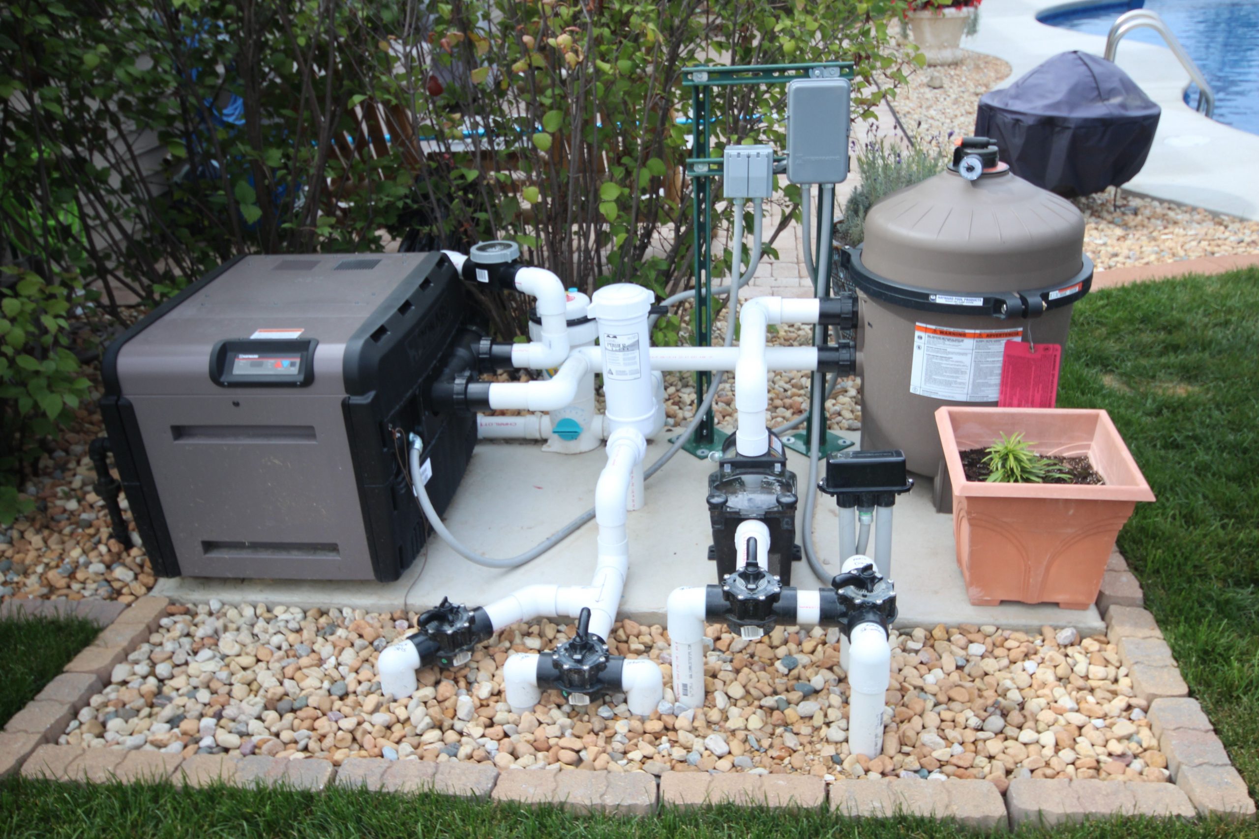 Complete pool system with pump, filter, natural gas heater and chlorinator with plumbing.